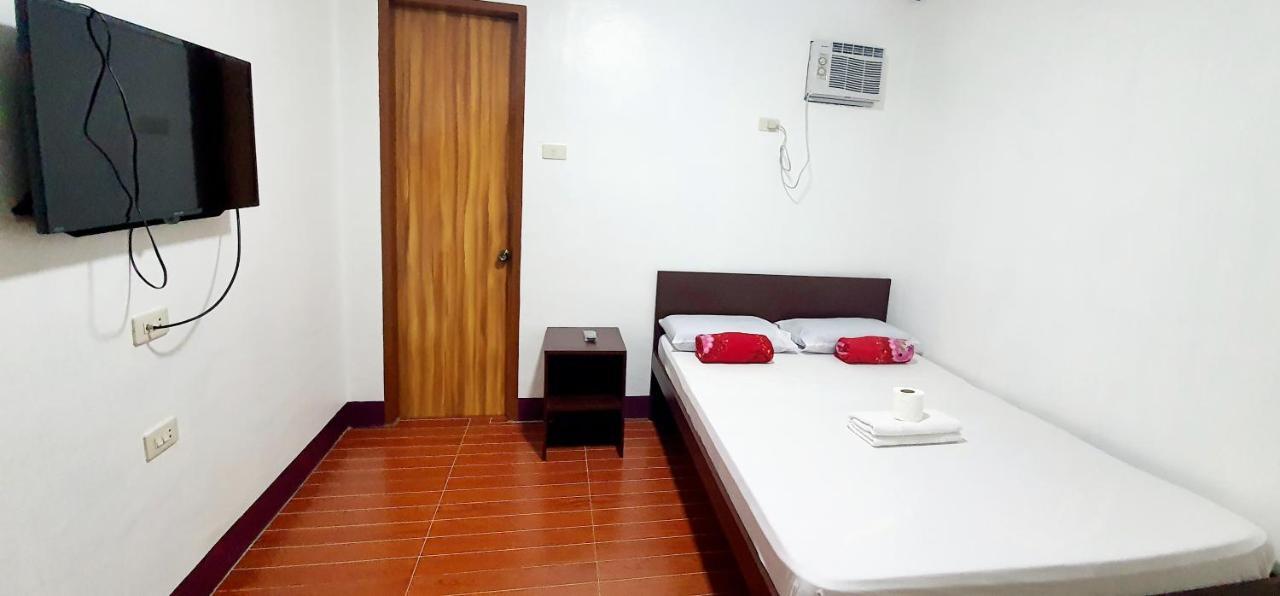 Sj Pabua Travellers Inn Mambajao Exterior photo