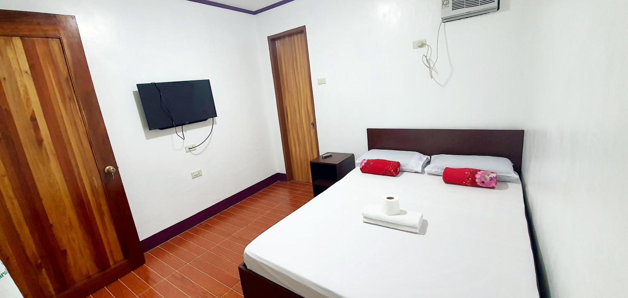 Sj Pabua Travellers Inn Mambajao Exterior photo